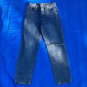 Distressed Blue Denim Jeans